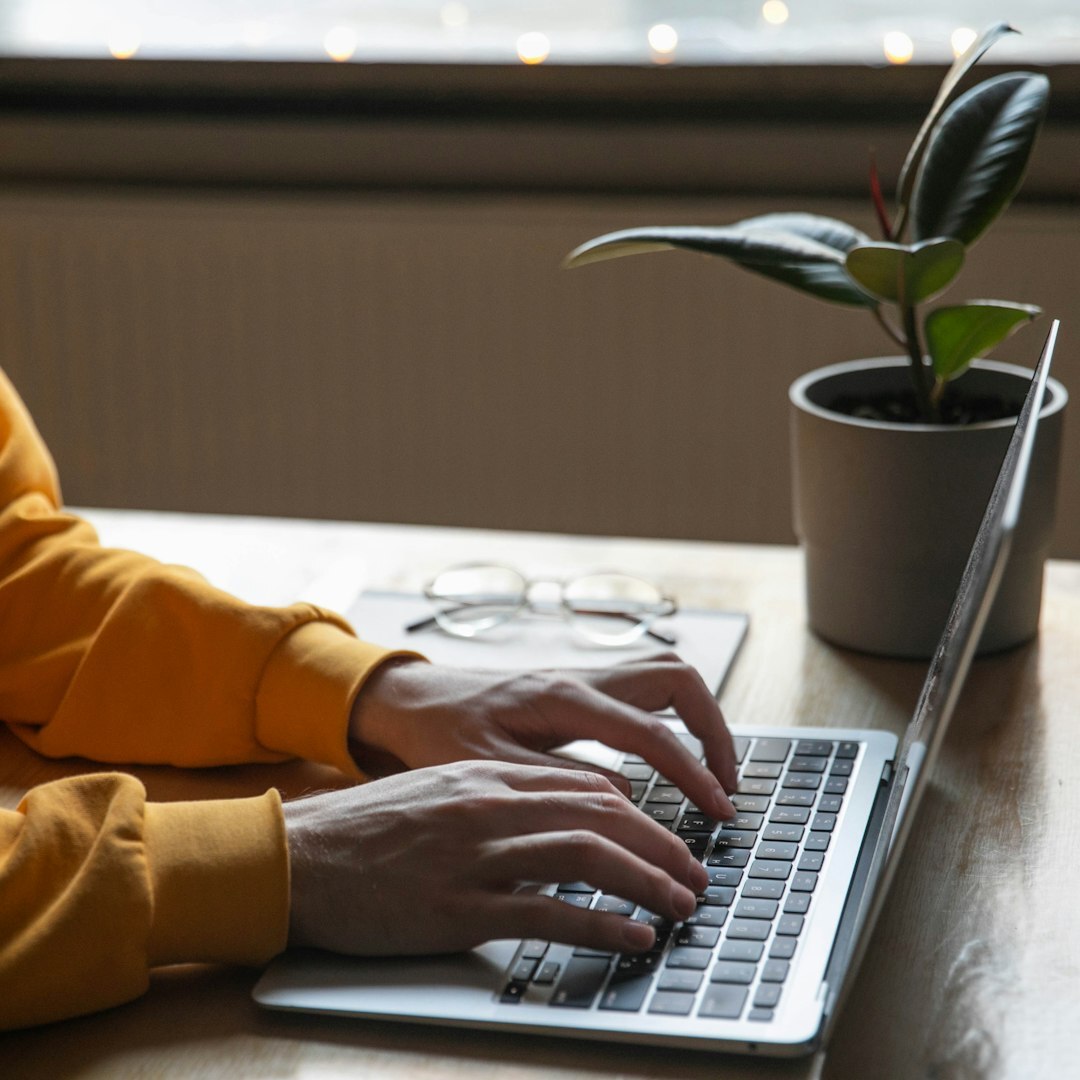 person using laptop for research